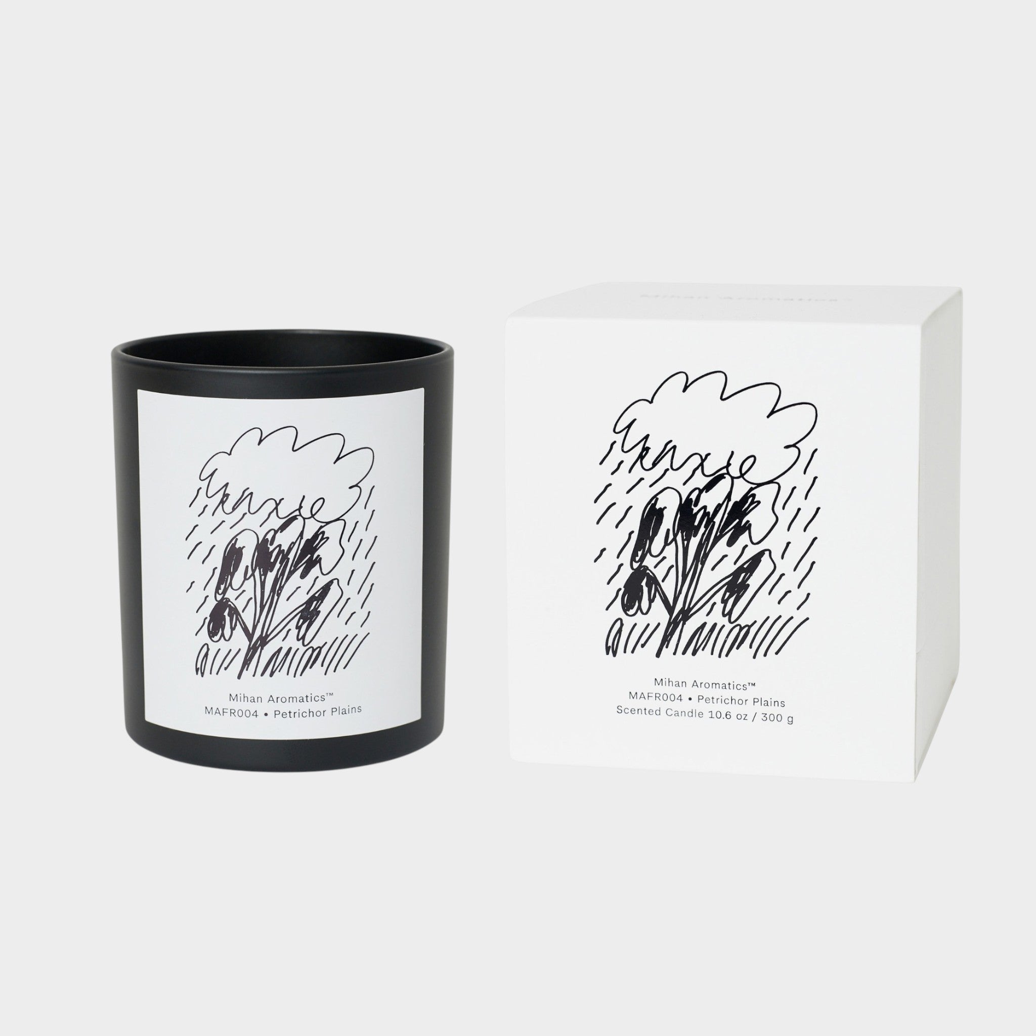 keep-collections Mihan Aromatics Guilty Story scented candle in a matte black glass jar with a white illustrated box.