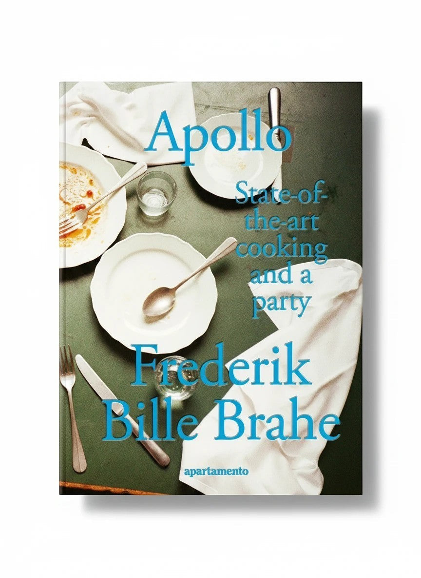 keep-collections Apollo cookbook by Frederik Bille Brahe featuring a table setting with plates and cutlery.
