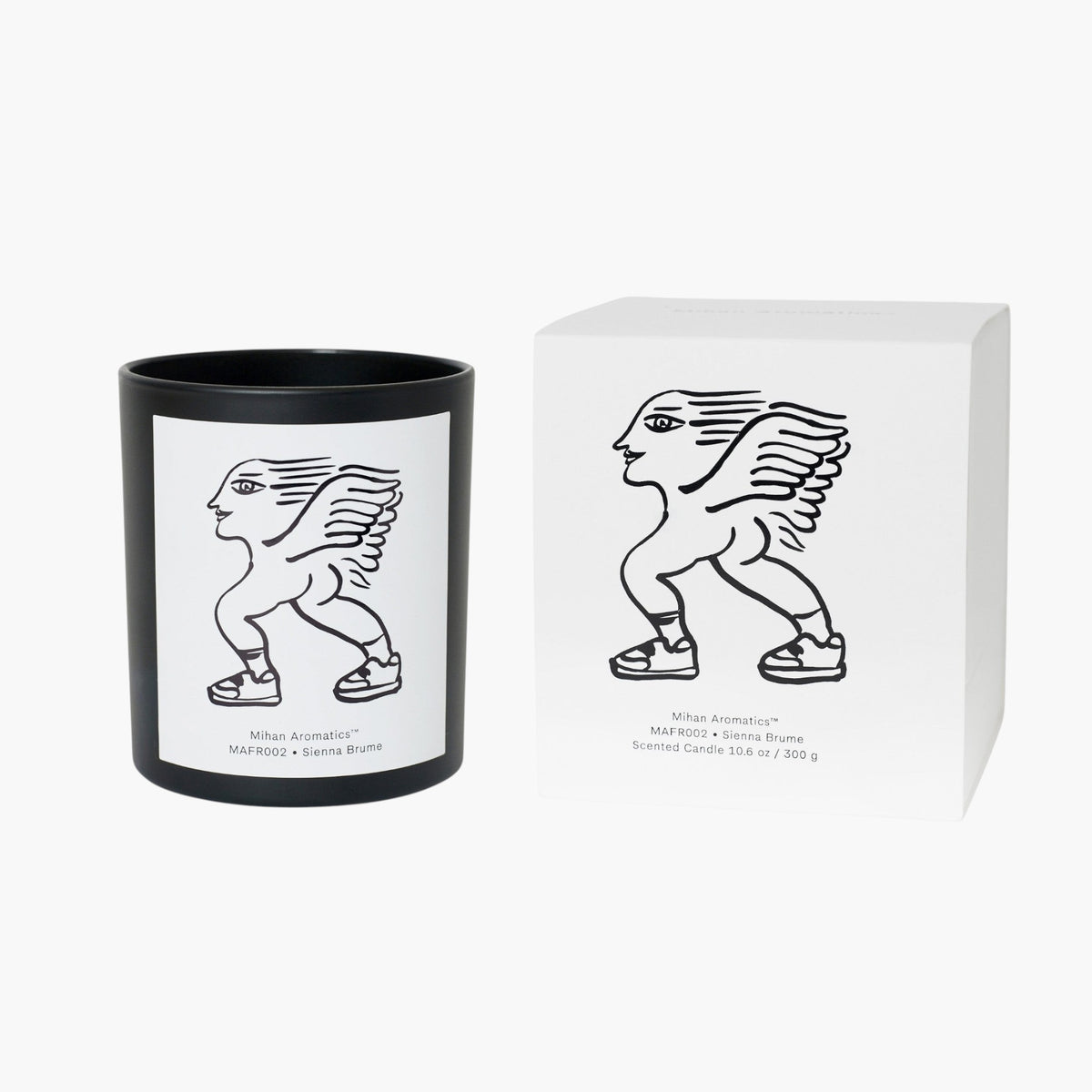 keep-collections Mihan Aromatics Sienna Brume scented candle in a matte black glass jar with matching white gift box